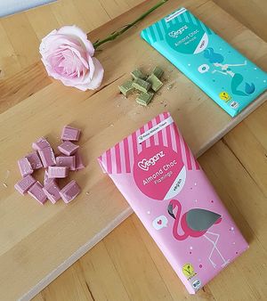 Two types of chocolate produced by the store's own brand: raspberry flavor and matcha flavor at Veganz in Berlin