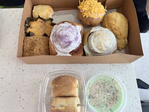 Sliders, ube and pandan cinnamon rolls, cheesy bun, scone, cornbread, etc.  at San and Wolves in Long Beach