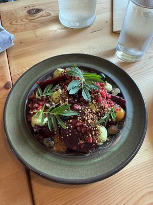 berries, beets & basil (red roasted beets, apricot jam, basil cheese, blueberries, raspberries, koji quinoa crumble marigold)  at Feral in Portland