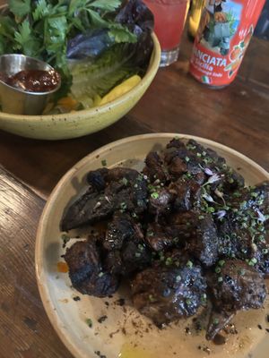 Lions mane and greens  at Feral in Portland