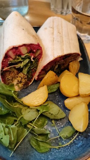MEDI WRAP (VG) - €10.50
Crispy falafel, beetroot hummus, cucumber, spring onions and mixed leaves in a flour tortilla at Jay Kay's Cafe in Dublin