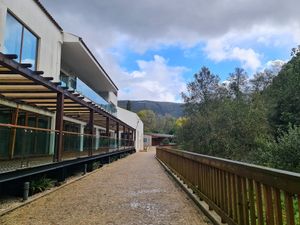 The restaurant overlooking the river. at Hídrica do Caima in Oliveira De Azemeis