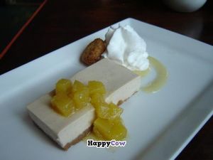 Vanilla bean cheesecake with pineapple compote, coconut whipped cream and a macaroon at The Grange in Providence