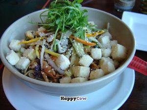 Large plate: Udon noodles, tofu, kimchi, asian vegetables, pea greens at The Grange in Providence