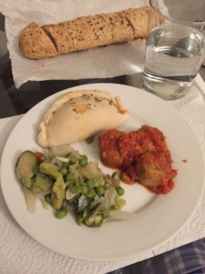 empanadas, soy meatballs in gravy and vegetables at Vegetart Cuina Vegana in Barcelona