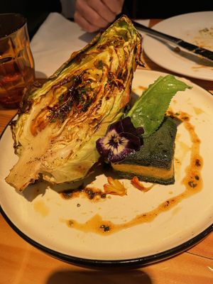 Grilled cabbage with tofu/almond paste and polenta/Spinach cakes  #Veganuary at Rasoterra in Barcelona