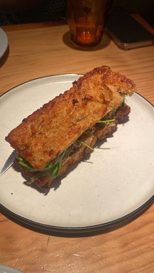 Focaccia specials dish with kimchi and spinach   at Rasoterra in Barcelona