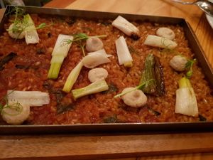 Whole grain rice with calcots at Rasoterra in Barcelona
