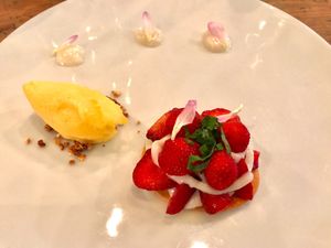 Strawberry tartlet, vanilla, shiso and orange ice cream.
I'm not much of a sweets person but I decided to try one of their desserts. This was tasty but the portion seemed pretty small. If you're a sweets person you'll enjoy this especially of you love fruity desserts. at Rasoterra in Barcelona