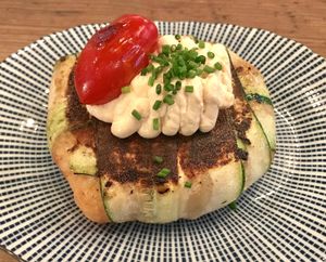 Summer trinxat (typical potato mash) with hot kimchi mayo and a charred cherry tomato.
This dish was delicious. It's basically mashed potatoes wrapped in zucchini and baked/seared to make it look like a baked potato haha. It was perfectly seasoned and the kimchi mayo and charred cherry tomato worked great with it. If you're a fan of potatoes (like me) you'll love this. at Rasoterra in Barcelona