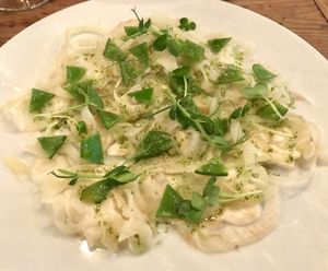 Fennel carpaccio, green peas, coriander flowers, lime zest and coriander oil.
This was probably the most underwhelming dish I had here. It was expensive and not satisfying. Don't waste your money and appetite on this dish, there are a lot of other delicious things to try on the menu. at Rasoterra in Barcelona