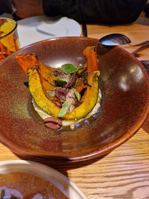 Red kury PUMPKIN, ganxet bean cream, kalamata olive crumble, dried leek powder (gf) at Rasoterra in Barcelona