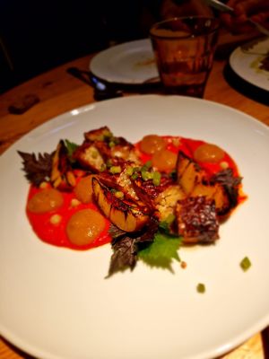 Homemade almond TEMPEH, baked red pepper, pickled and grilled nectarine, Belltall garlic sprout,
preserved lemon, shiso (gf) at Rasoterra in Barcelona