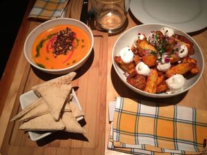 smoked dip with pita and patatas bravas at Rasoterra in Barcelona