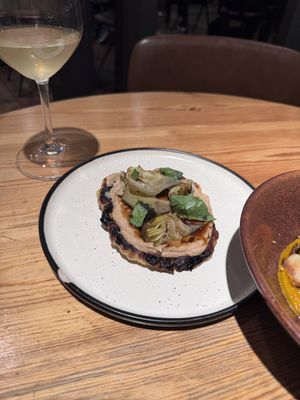  Grilled flatbread, confit Prat ARTICHOKE, cauliflower cream, artichoke leaf caramel at Rasoterra in Barcelona