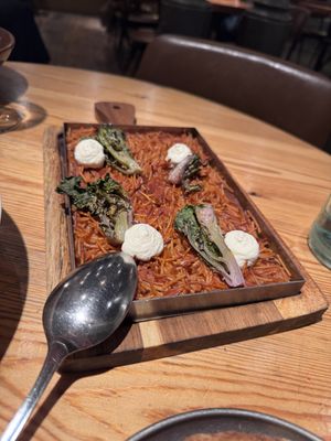  FIDEUÀ of wholegrain noodles, kalettes and garlic sprout veganese at Rasoterra in Barcelona