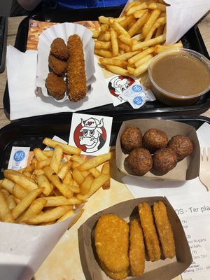 Fries, chicken nuggets, other chicken stuff, falafel balls and a typical Belgian sauce  at Pepas Vegan Frituur in Leuven