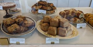 Clockwise:  Mushroom Caramelized Onion Brioche, Hot Cross Buns, Biscuit & Jam, Blueberry Rosemary Scone at Orange & Blossom Patisserie in Portland