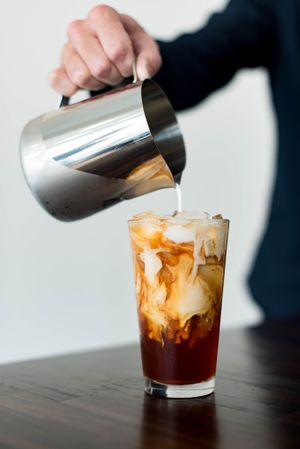 Organic + Vegan (oak milk) Iced Masala Chai Latte at the Rockin' Cat Organic Cafe. at Rockin' Cat Organic Cafe & Roastery in Bellevue