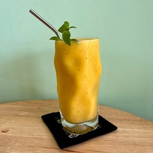 Sunshine Mango Smoothie: Mango, banana and coconut milk. at Cambodhi in Kampot