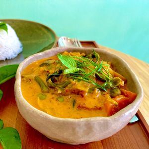 Vish Amok:
Cambodian national dish. A creamy curry made with a traditional herb and spice paste. Served with white or red rice. at Cambodhi in Kampot
