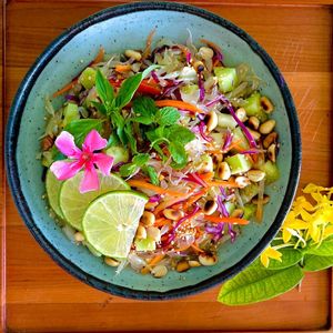 Pomelo Salad:
Sweet and sour salad with pomelo, cabbage, carrots, herbs and cucumber. Served with peanuts and lime. at Cambodhi in Kampot