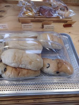 Plain and olive ciabatta at Bakery Café in Seogwipo