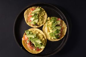 Breakfast Tacos - Scrambled tofu, sliced avocados, sautéed mushrooms, diced tomatoes, and fresh cilantro, in homemade soft corn tortillas. at Nabati Bistro in Dubai