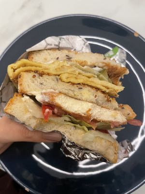 Excellent vegan Club sandwich with few modifications ( additional only egg, without bacon)   at Nabati Bistro in Dubai