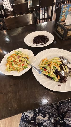 Mango Salad 99 THB, Rice 40 THB, Water 25 THB; with tax and VAT 195 THB  at Krua Boon - Silom - ครัวบุญ in Bangkok