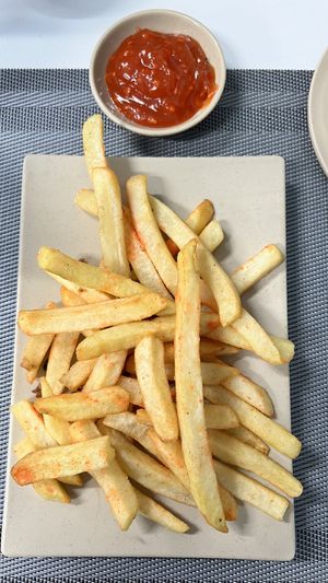French fries came with paprika seasoning and homemade (?) tomato sauce - very goodd  at An Nhi Chay in Hue