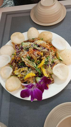 Mixed salad with orchid flowers 🌺 at An Nhi Chay in Hue