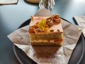 STONE WAY SUMMER

Orange sponge, sunflower praline buttercream, orange blossom apricot jam, li hung Mui buttercream frosting, apricot gelée at Paper Cake Shop in Seattle