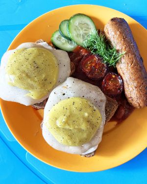 Bodhisattva's Breakfast: vegan "fried eggs", crusty fried bread with sauce + beans in tomato sauce, house-made seitan sausage, cucumber, fried cherry tomato. Special, Nov. 18-19th at Internet Cafe in Yerevan