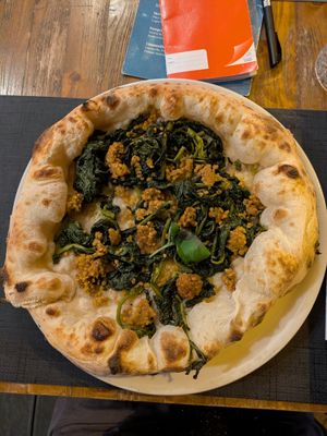 Greens and vegan sausage pizza at Mercato Pompeiano Restaurant in Pompei