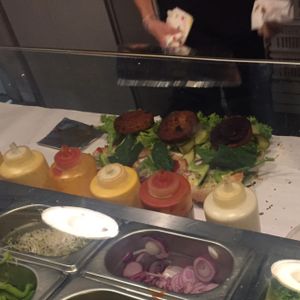 making the burgers at Krowarzywa - Hoza in Warsaw