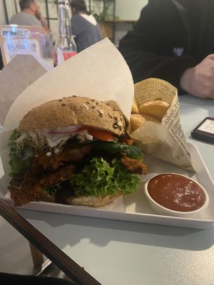 Pastrami burger with fries  at Krowarzywa - Hoza in Warsaw