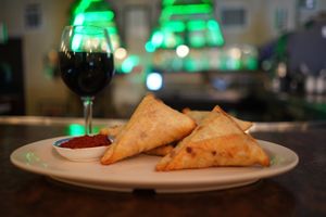 sambusa & wine  at Mesob Ethiopian Restaurant in Denver
