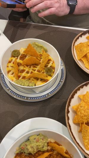 Vegan nachos with an extra plate of nachos to dip   at Veganapati in Lisbon
