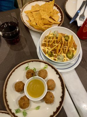 Sausage croquets and nachos   at Veganapati in Lisbon