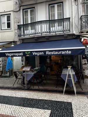 The entrance, obviously, with outdoor seating, too.  at Veganapati in Lisbon