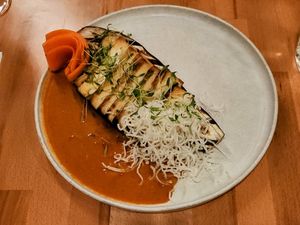 Grilled tofu, eggplant, pickled carrot, curry sauce. The flavours together were incredible.  at St. Elsewhere in Ottawa