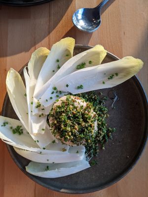 Cashew burrata with endives and white balsamic vinegar. at St. Elsewhere in Ottawa