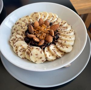 Oatmeal with cinnamon, bananas, almonds, and raisins    at Sano Bistro in Progreso