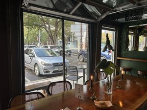 I dude with garage doors open   at Immortal Cafe & Supply in Sacramento