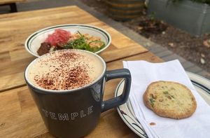 Cookie + coffee + tempeh bowl, inside a temple mug apparently haha at Immortal Cafe & Supply in Sacramento