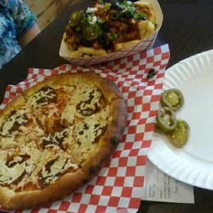 From my first visit to Vegan Pizza over a year ago. Pepperoni and cheer pizza with chilli cheer fries.  at Vegan Pizza in Garden Grove