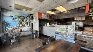 Counter and part of the seating area. More seating to the right of this pic.  at Vegan Pizza in Garden Grove