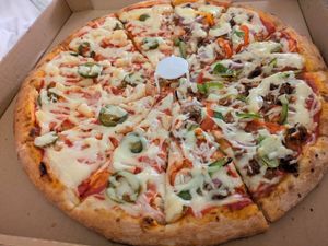 Half Hawaiian half Philly cheese steak at Vegan Pizza in Garden Grove