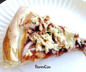 A slice of Vegan BBQ Chick'un pizza, a closer look. at Vegan Pizza in Garden Grove